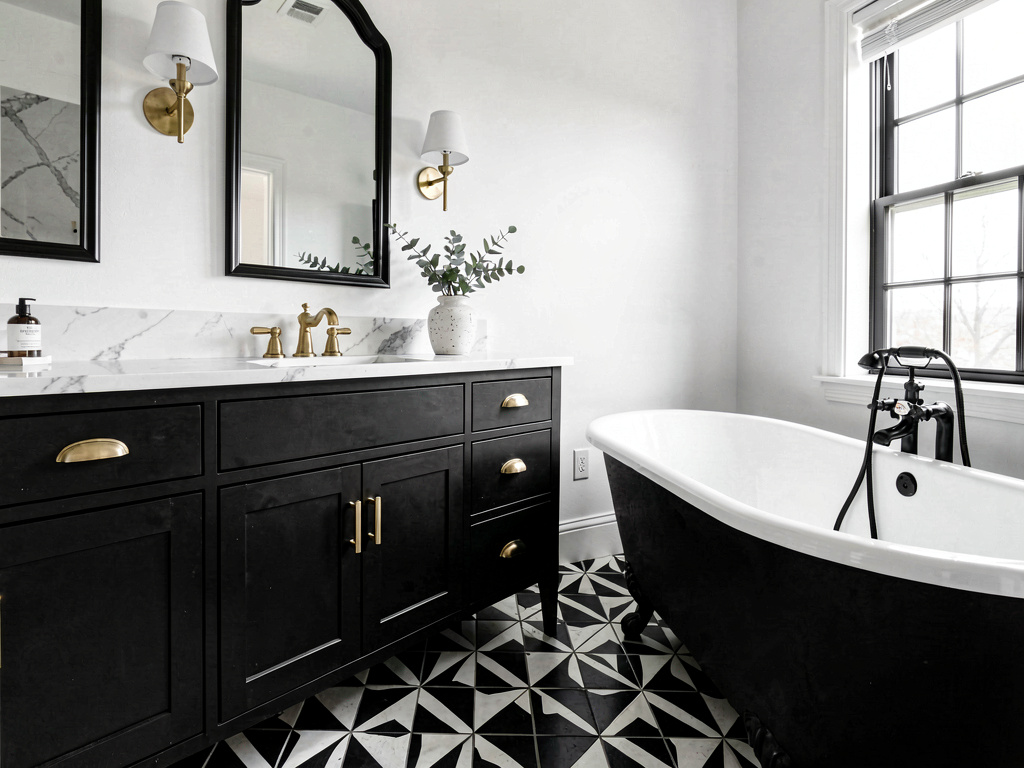 High-contrast black and white bathroom with black vanity, white marble countertop and patterned floor
