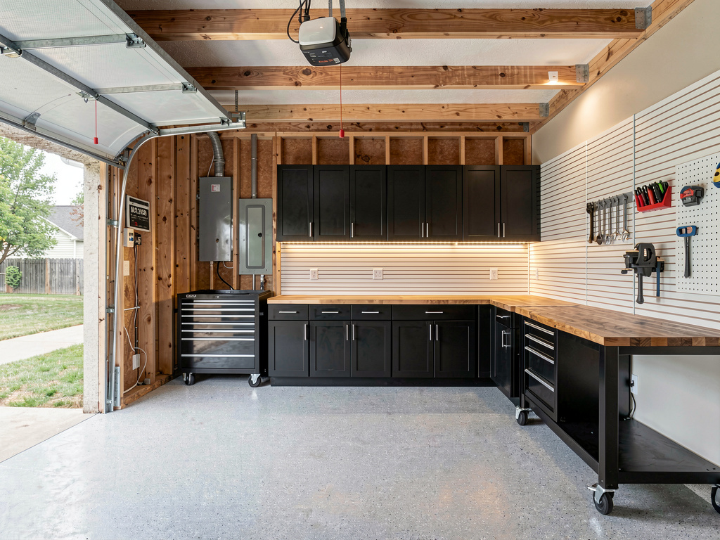 A garage redesigned in modern workshop style by Remodel AI