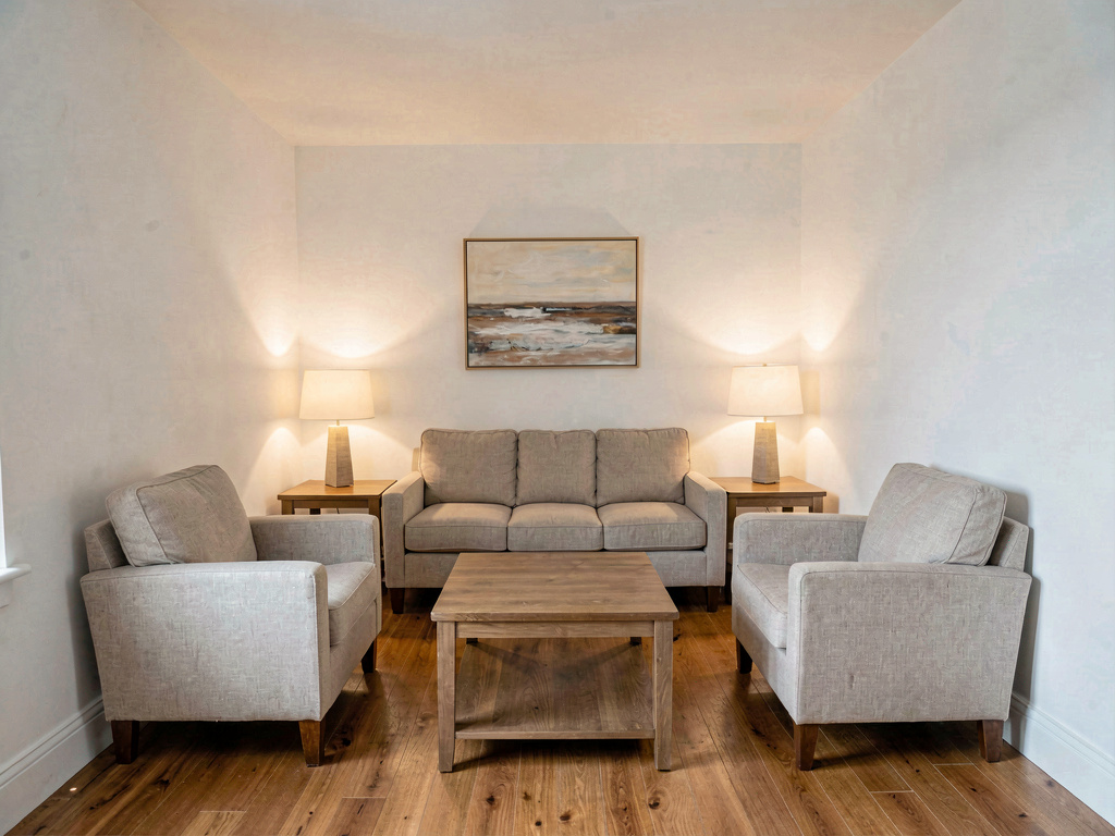 Small living room layout with symmetrical furniture arrangement